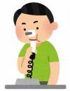 イラスト：肺年齢測定をする男性