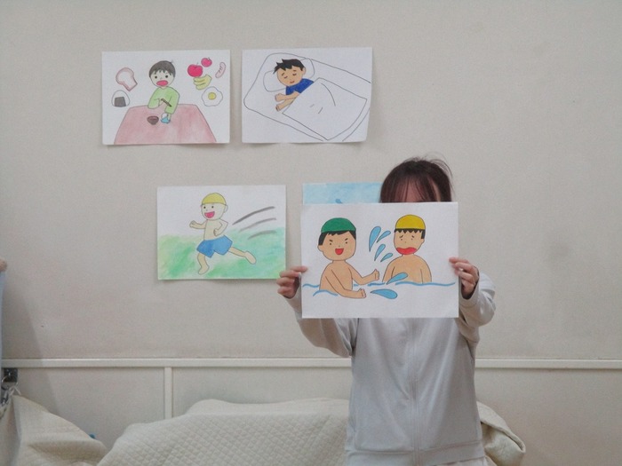 プールの使い方を絵で知らせているところ